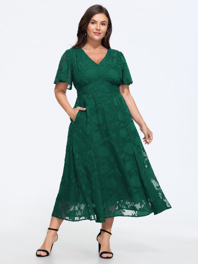 bloom chic dresses Alice in Dress Bleu Blush Boutique Lightweight satin material Slight stretch Fully lined Strapless style Gel grip on inner bust Elasticated band at the back Foldover bust detail Invisible side zip Bias cut Cowl draping at back Perfect for wedding guest looks Plus Size and Curvy Dresses