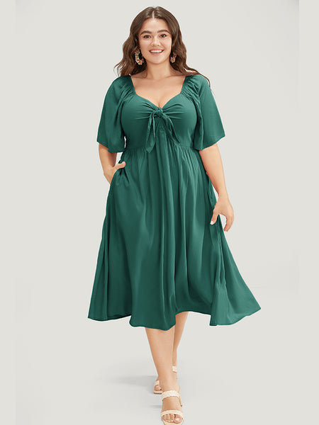 Solid V Neck Ruched Knotted Pocket Ruffle Hem Dress – BloomChic