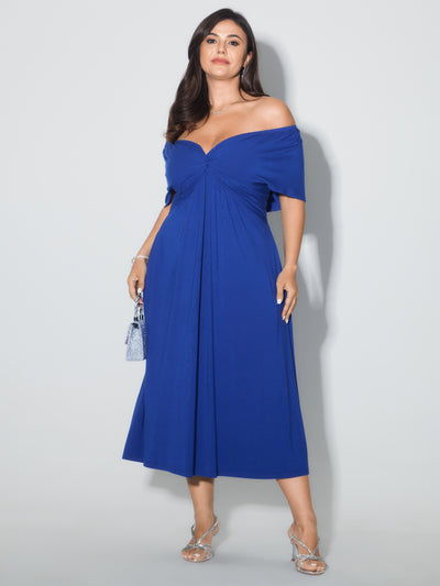 green emerald velvet dress Bella and Bloom Boutique