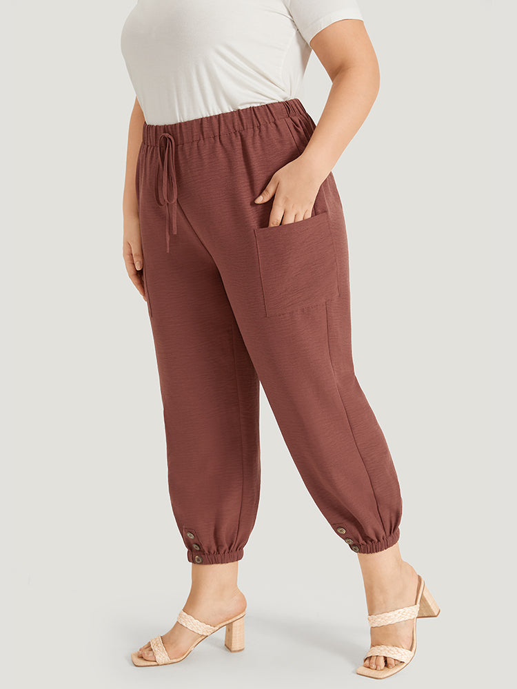 Solid Patched Pocket Bowknot Button Detail Pants