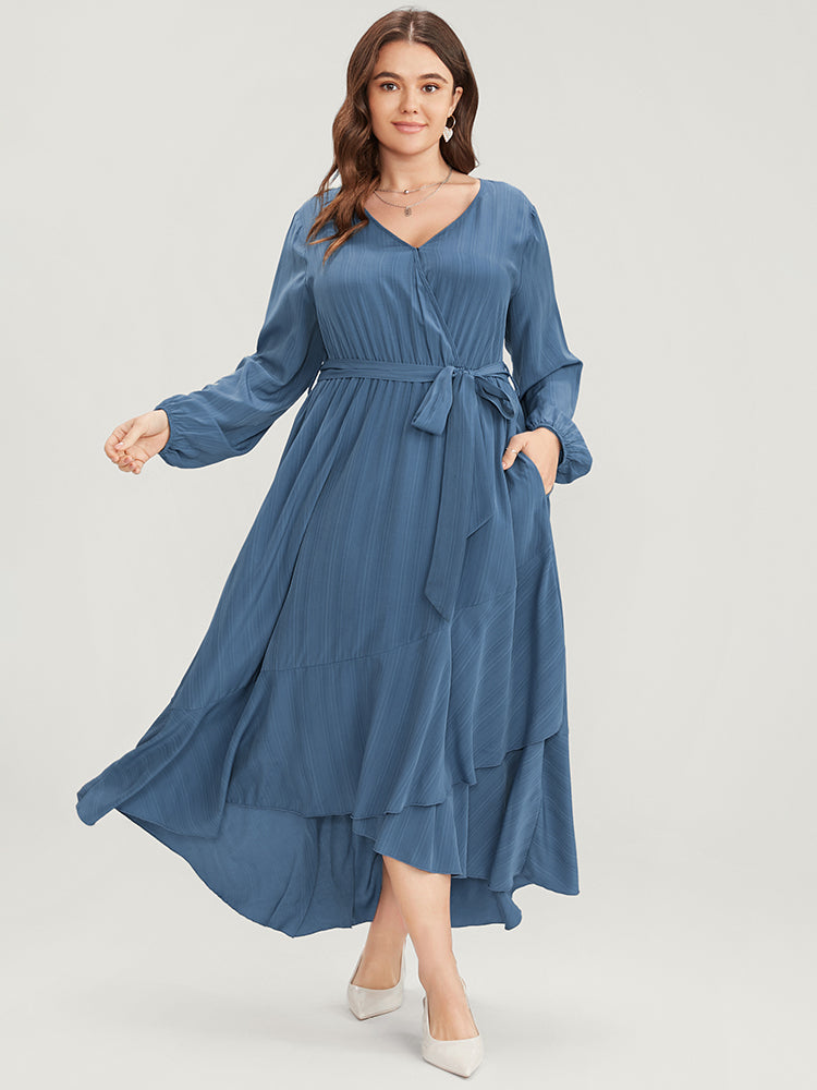 Solid Surplice Neck Lantern Sleeve Pocket Belted Asymmetrical Hem Dress