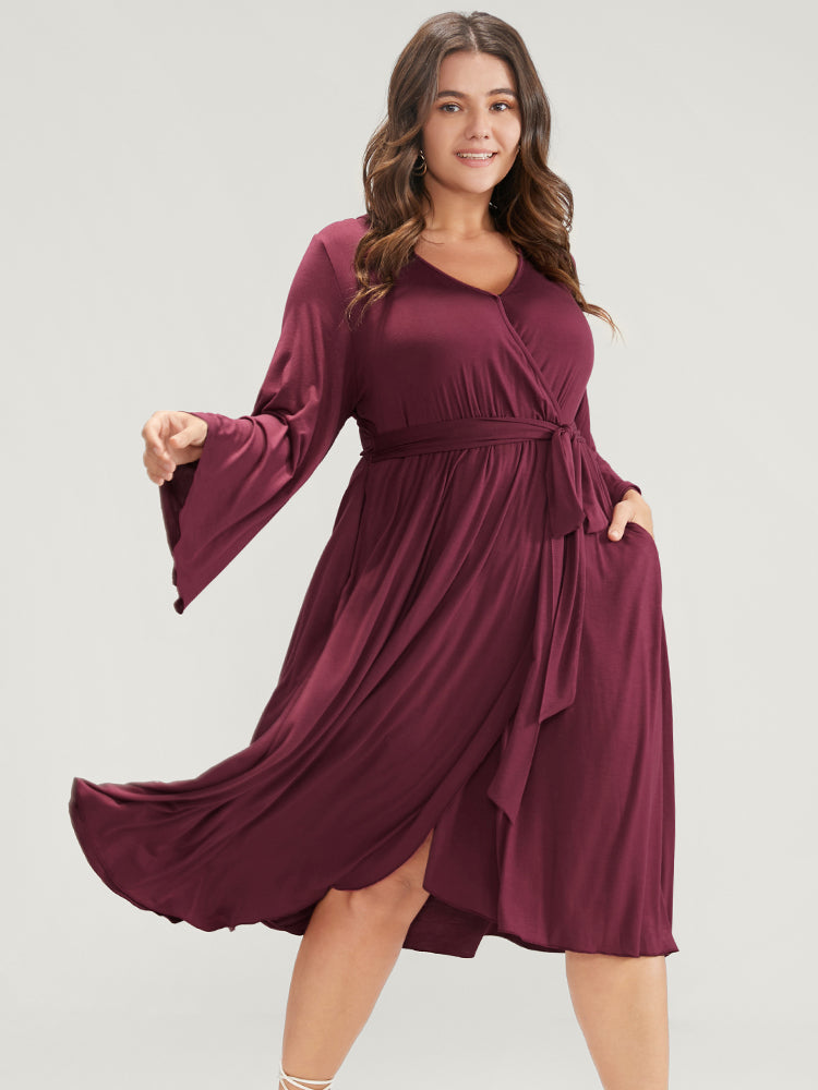 Solid Wrap Knotted Front Pocket Bell Sleeve Asymmetrical Hem Dress