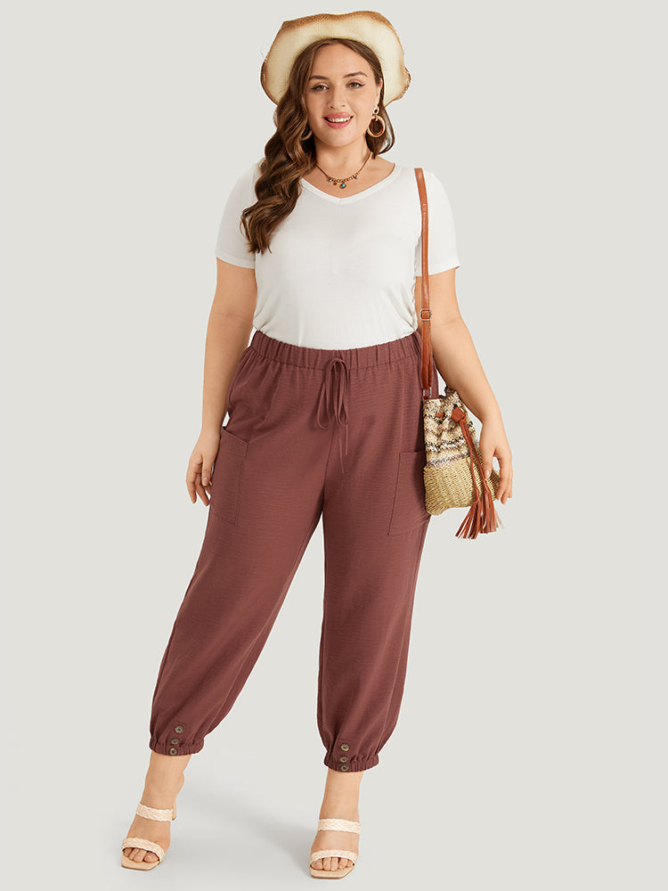 Solid Patched Pocket Bowknot Button Detail Pants