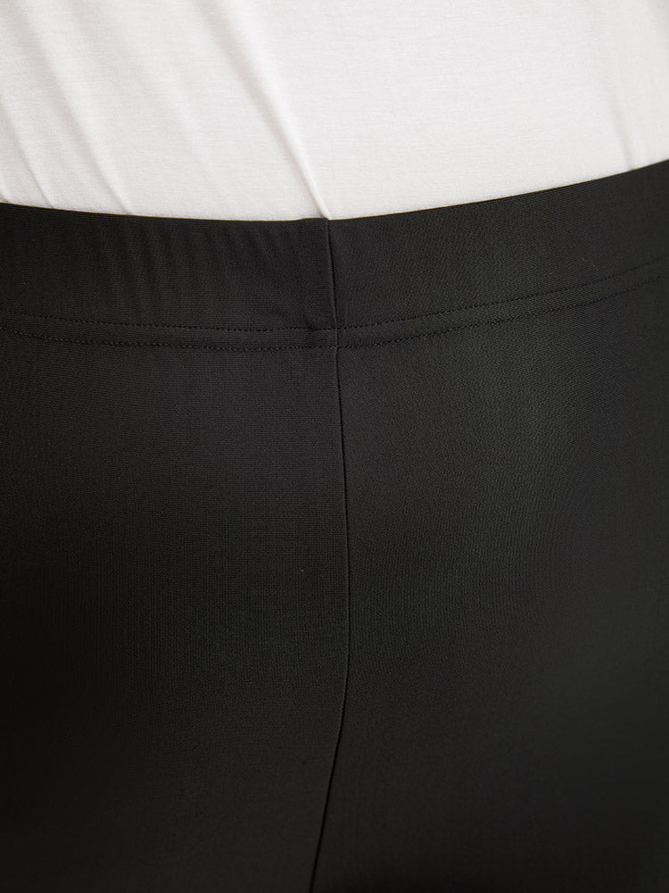Plain Button Detail Dolphin Hem Leggings