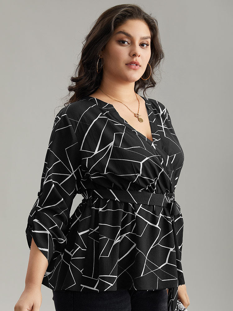belted wrap blouse