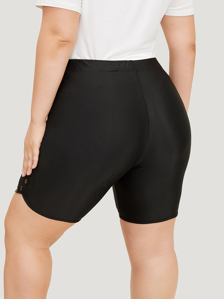 Plain Button Detail Dolphin Hem Leggings
